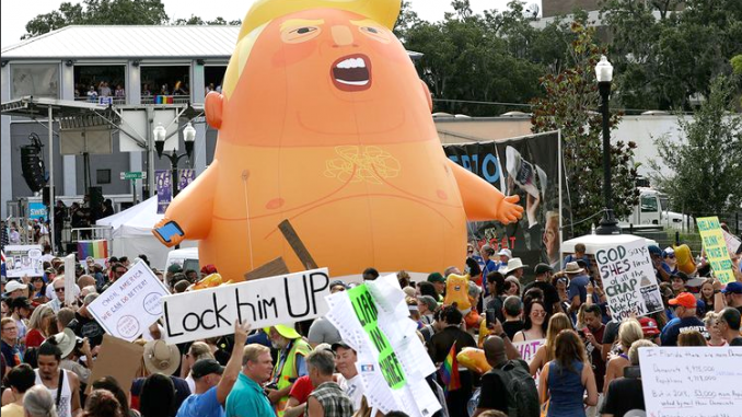 The Trump baby balloon is expected to make an appearance over Los Altos today (Sept. 17), according to the anti-Trump group The Backbone Campaign. In this AP file photo, the balloon is seen over a demonstration in Orlando, Fla., in June.