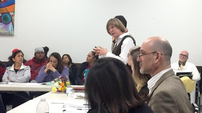 San Mateo County Office of Education Superintendent Anne Campbell, standing, tells parents about changes in the Ravenswood City School District’s preschool program. Post photo.