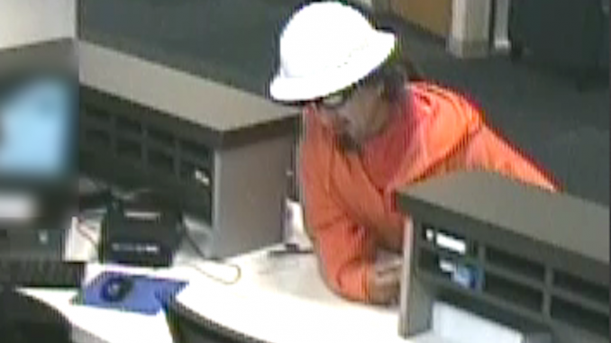 This man held up the Comerica Bank branch at 250 Lytton Ave. today (April 13). Surveillance video screen grab from Palo Alto Police.