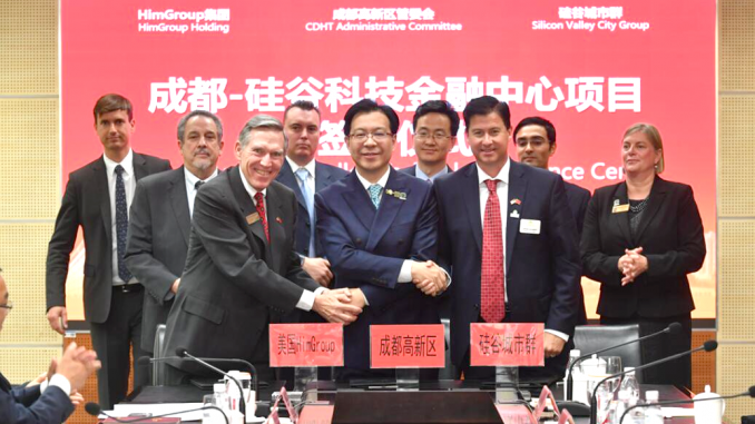 Chinese media has circulated this photo of mid-Peninsula officials at a signing ceremony in Chengdu, China. Local officials in the shot include, Mountain View Mayor Lenny Siegel, second from left, and Menlo Park City Councilwoman Kirsten Keith, far right. In front at right is former Mountain View councilman Mike Kasperzak.