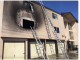 A two-alarm fire struck this apartment house at 2411 Middlefield Road today (May 19). Photo from Redwood City Fire Department via Twitter.