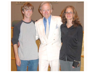 Tom Wolfe poses with Jenny Davis, a former events coordinator at Kepler’s Books, and another Kepler's employee at a 2004 bookstore event. Photo courtesy of Kepler's CEO Praveen Madan.