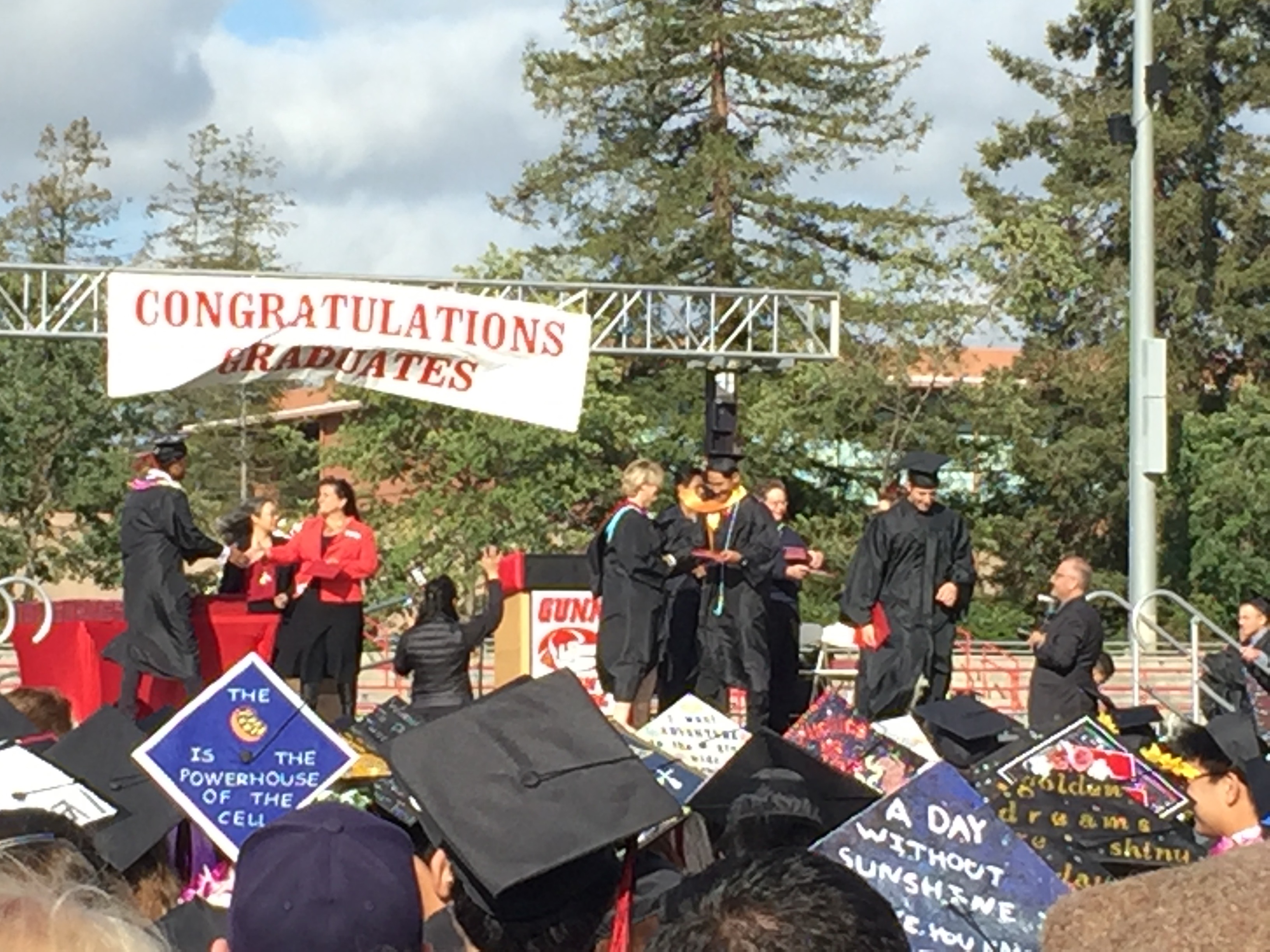 Gunn High School graduates walk to the stage to receive their diplomas. Post photo by Emily Mibach.