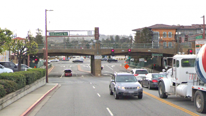 Caltrain passes over Holly Street in San Carlos