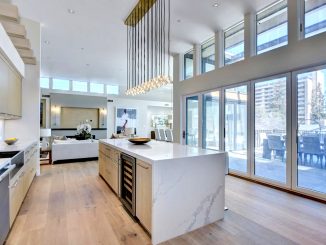 The kitchen in the $35,000-a-month penthouse at 430 Forest Ave. in Palo Alto. The Marc apartment building, where penthouses go for $9,000 to $16,000 a month, can be seen from the window.