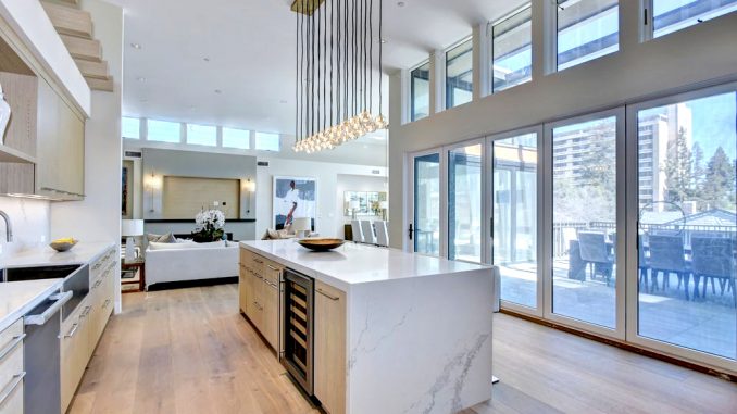 The kitchen in the $35,000-a-month penthouse at 430 Forest Ave. in Palo Alto. The Marc apartment building, where penthouses go for $9,000 to $16,000 a month, can be seen from the window.