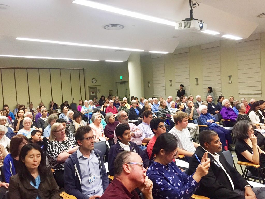 The audience listens to the Palo Alto school board candidates at a forum held at the Channing House. Post photo by Allison Levitsky.
