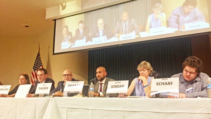 Palo Alto school board candidates, from left, Stacey Ashlund, Christopher Boyd, Ken Dauber, Shounak Dharap, Kathy Jordan and Alex Scharf participate in an election debate, hosted by Asian Americans for Community Involvement and the Palo Alto Chinese Parents Club. Photo by Allison Levitsky.