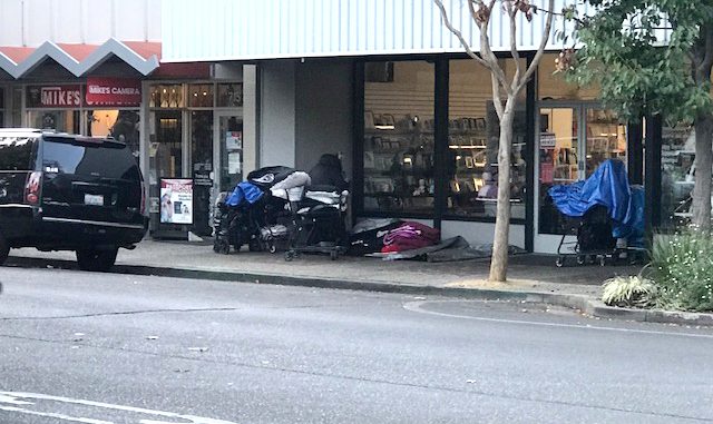 Downtown Menlo Park merchant Kerry Hoctor provided this photo of the belongings of a homeless woman who camps outside his store.