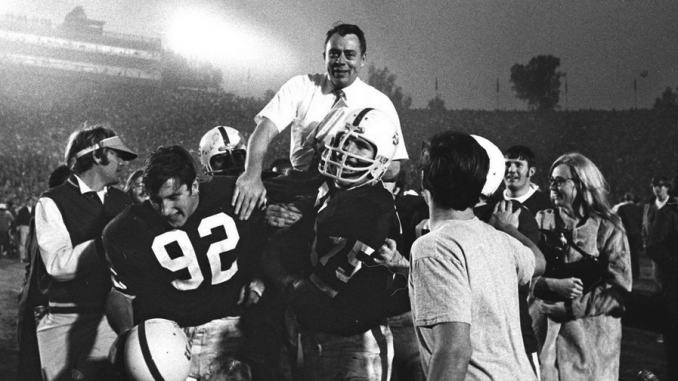 In this In this Jan. 1, 1971, file photo, Stanford coach John Ralston is carried off the field by his players after they defeated the Ohio State Buckeyes in the Rose Bowl game in Pasadena. AP photo.