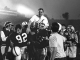 In this In this Jan. 1, 1971, file photo, Stanford coach John Ralston is carried off the field by his players after they defeated the Ohio State Buckeyes in the Rose Bowl game in Pasadena. AP photo.