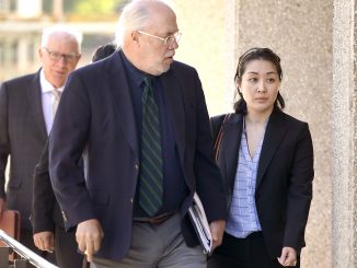 Tiffany Li, right, and her attorney, Geoff Carr, arrive at the San Mateo County Government Center in Redwood City on Sept. 12. AP file photo.
