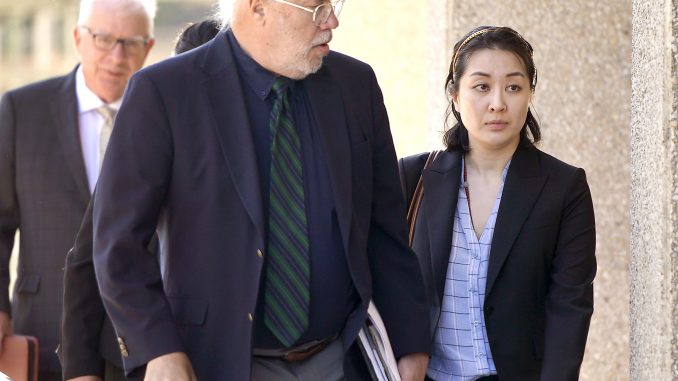 Tiffany Li, right, and her attorney, Geoff Carr, arrive at the San Mateo County Government Center in Redwood City on Sept. 12. AP file photo.