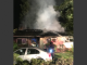 Firefighters pour water on a house on Hawthorne Avenue in Los Altos. Photo courtesy of the Santa Clara County Fire Department.